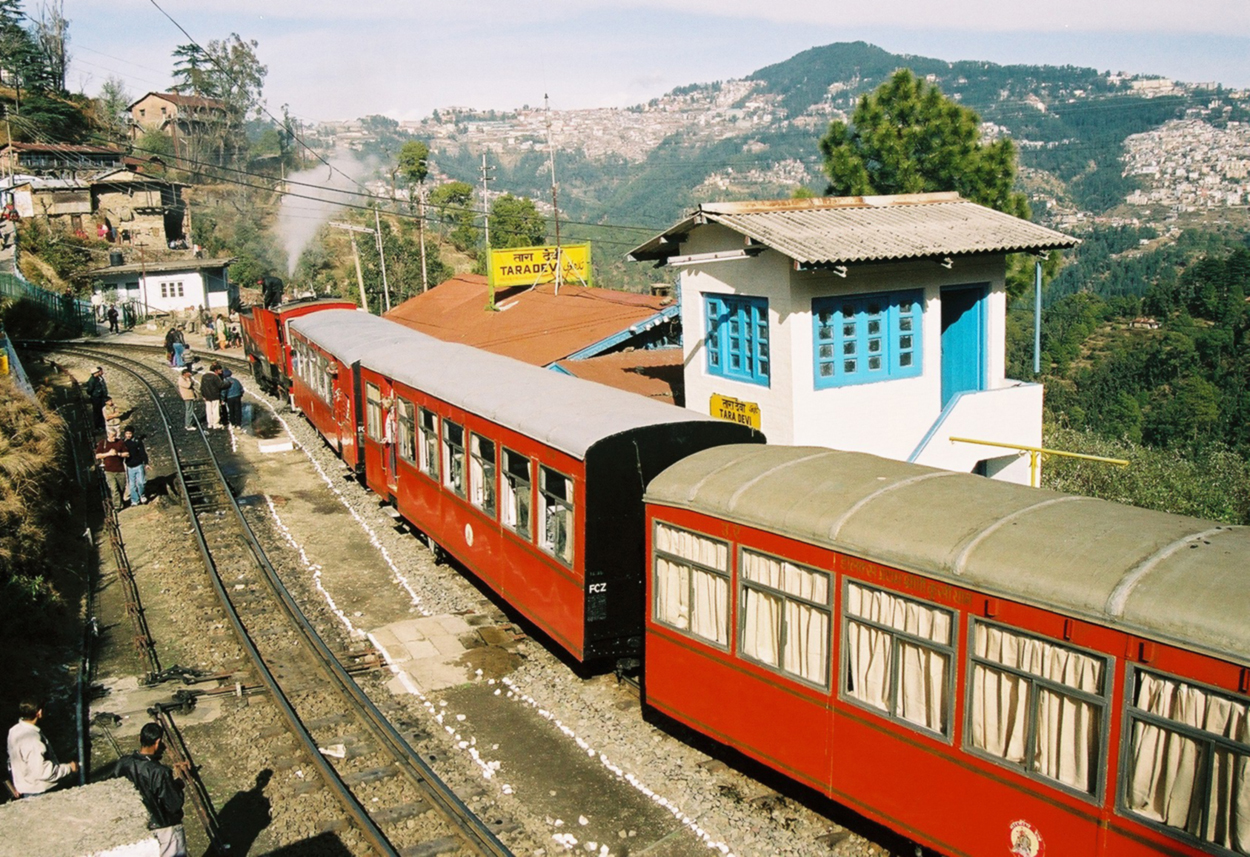 Kalka-Simla Railway. A Special train hauled by Steam Locomotive 520 waits to pass a service train at Taradevi. 13th February 2005 Photographer - A.M.Hurrell Cam