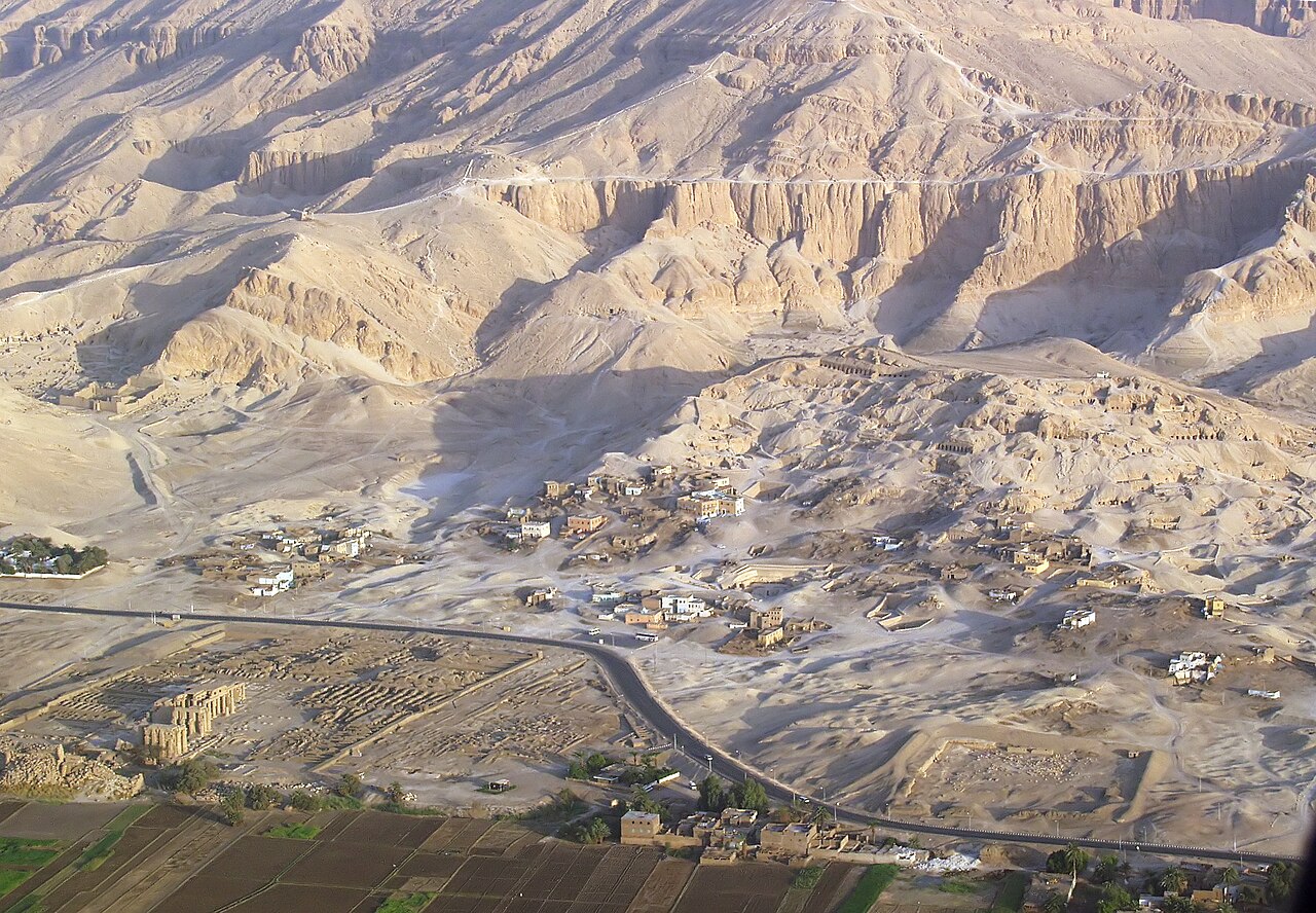 Aerial view of the Tombs of the Nobles. The buildings belong to Sheikh Abd el-Qurna. Lower left corner: Ramesseum (pictures on Commons: Ramesseum.