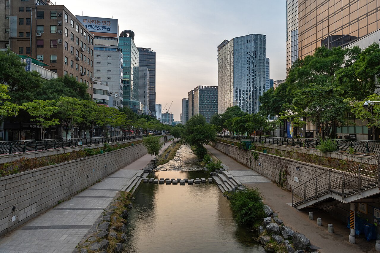 Cheonggyecheon stream, at sunrise, with trees in Seoul center, South Korea.