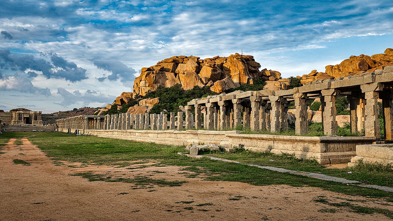 Hampi Bazaar, Hampi, Karnataka. The Hampi Bazaar is a well-known market place that spreads for more than one kilometer. The road passing through the market has 