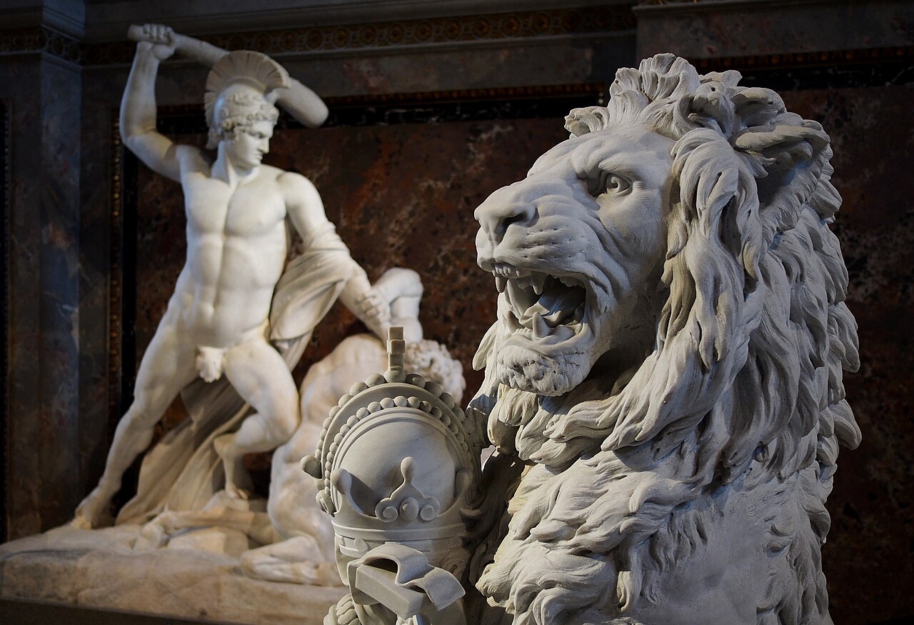 Sculpture of a lion with Habsburg imperial crown, Theseus in background (Theseus and Centaur by Antonio Canova). Kunsthistorisches Museum Vienna, Austria.