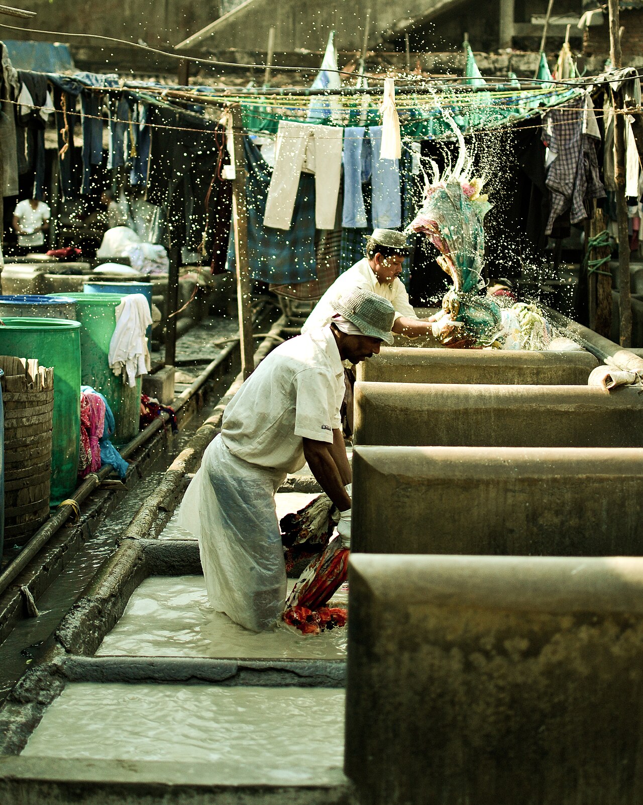 Dhobhis (Washermen) washing clothes at Dhobhi Ghat, Mahalaxmi, Mumbai