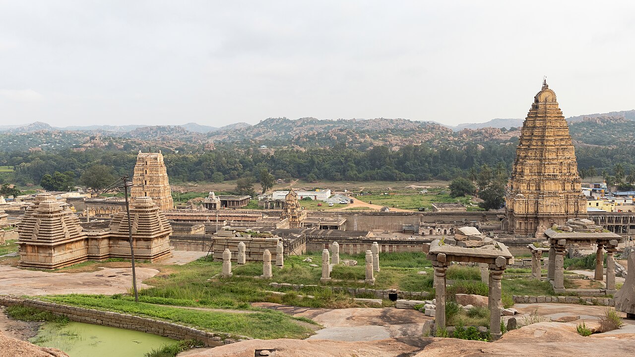 The complex of the Virupaksha Temple in Hampi is a significant architectural marvel and a pivotal site in the region's rich cultural heritage. This temple is de